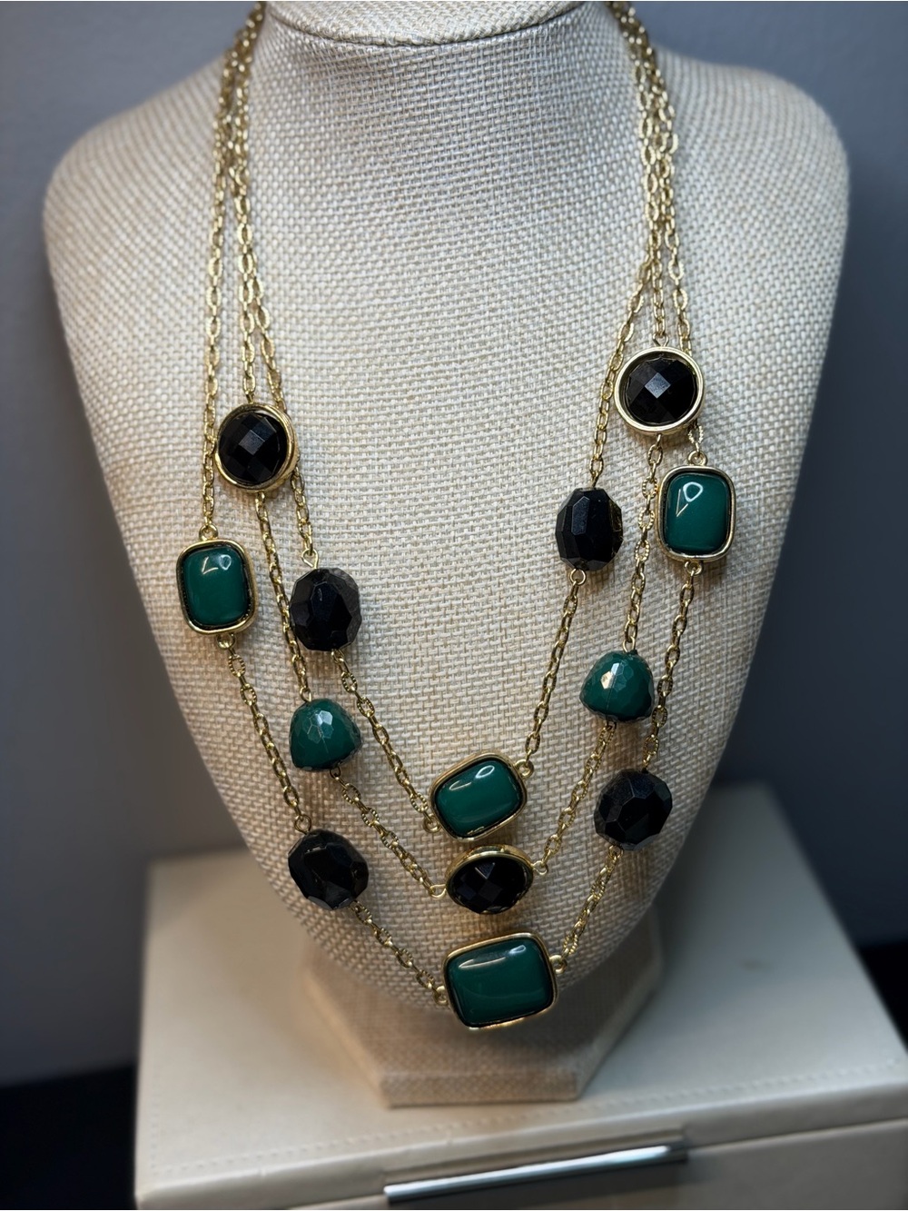 Gold Multi-Strand Necklace with Green and Black Gemstones
